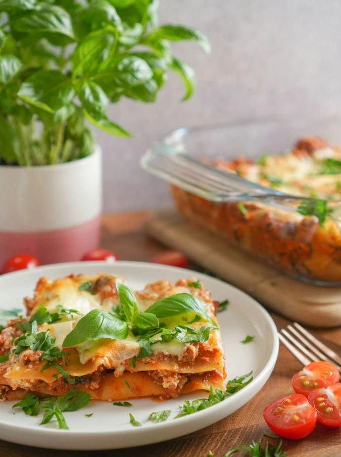 sliced pizza on white ceramic plate