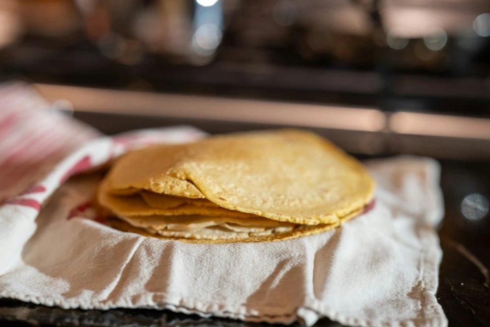 a couple of tortillas sitting on top of a napkin